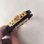 خرید دستبند چرم ورساچه طلایی